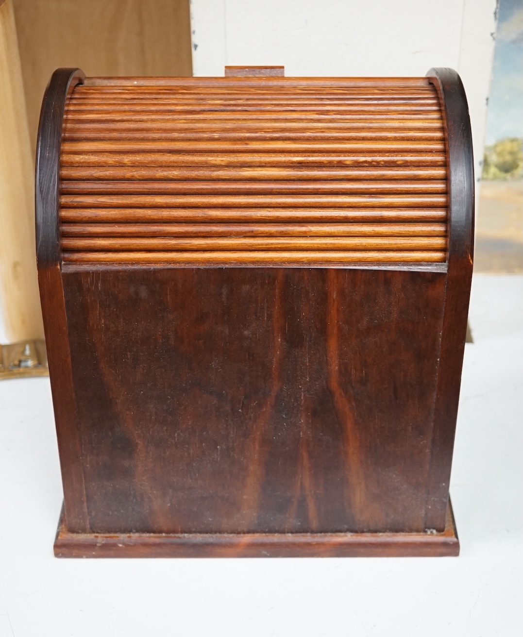 A tambour fronted stationery rack, 30cm high. Condition - fair